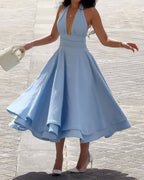 Sleeveless solid color waist-cinching dress
