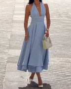 Sleeveless solid color waist-cinching dress