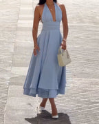 Sleeveless solid color waist-cinching dress