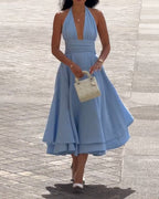Sleeveless solid color waist-cinching dress